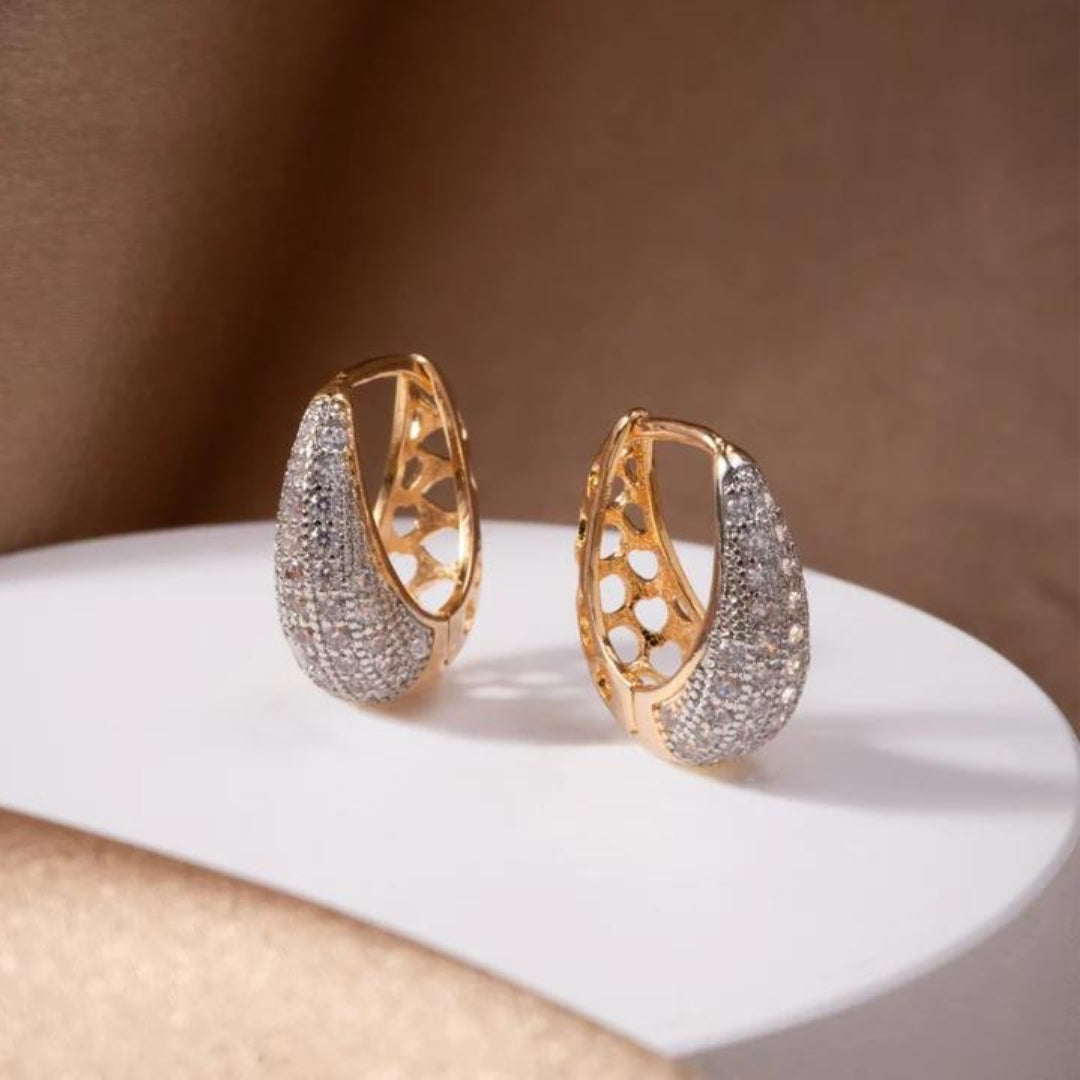 Boucles d'oreilles en Or Brillant : Élégance et Chic à chaque Instant