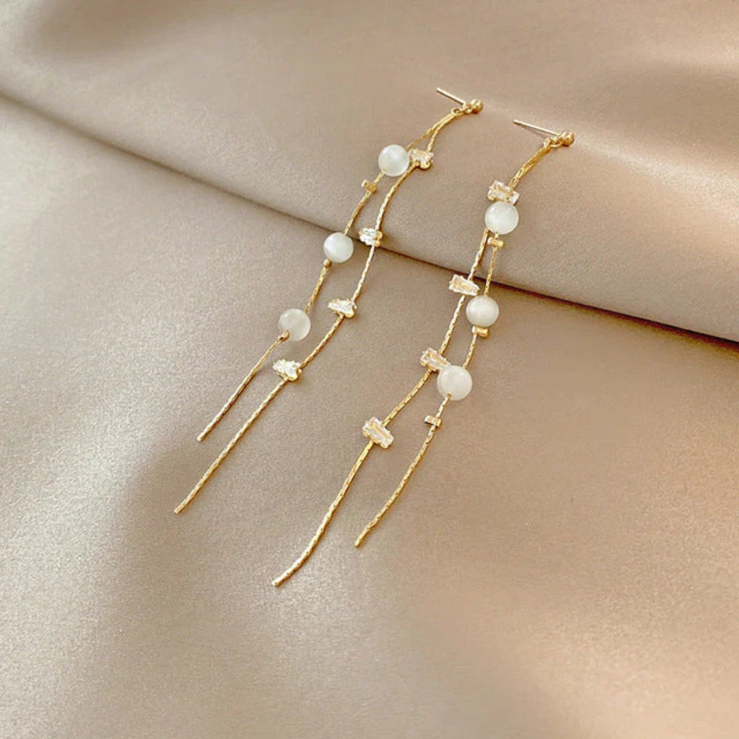 Boucles d'oreilles pendantes en perles raffinées et zirconias étincelants