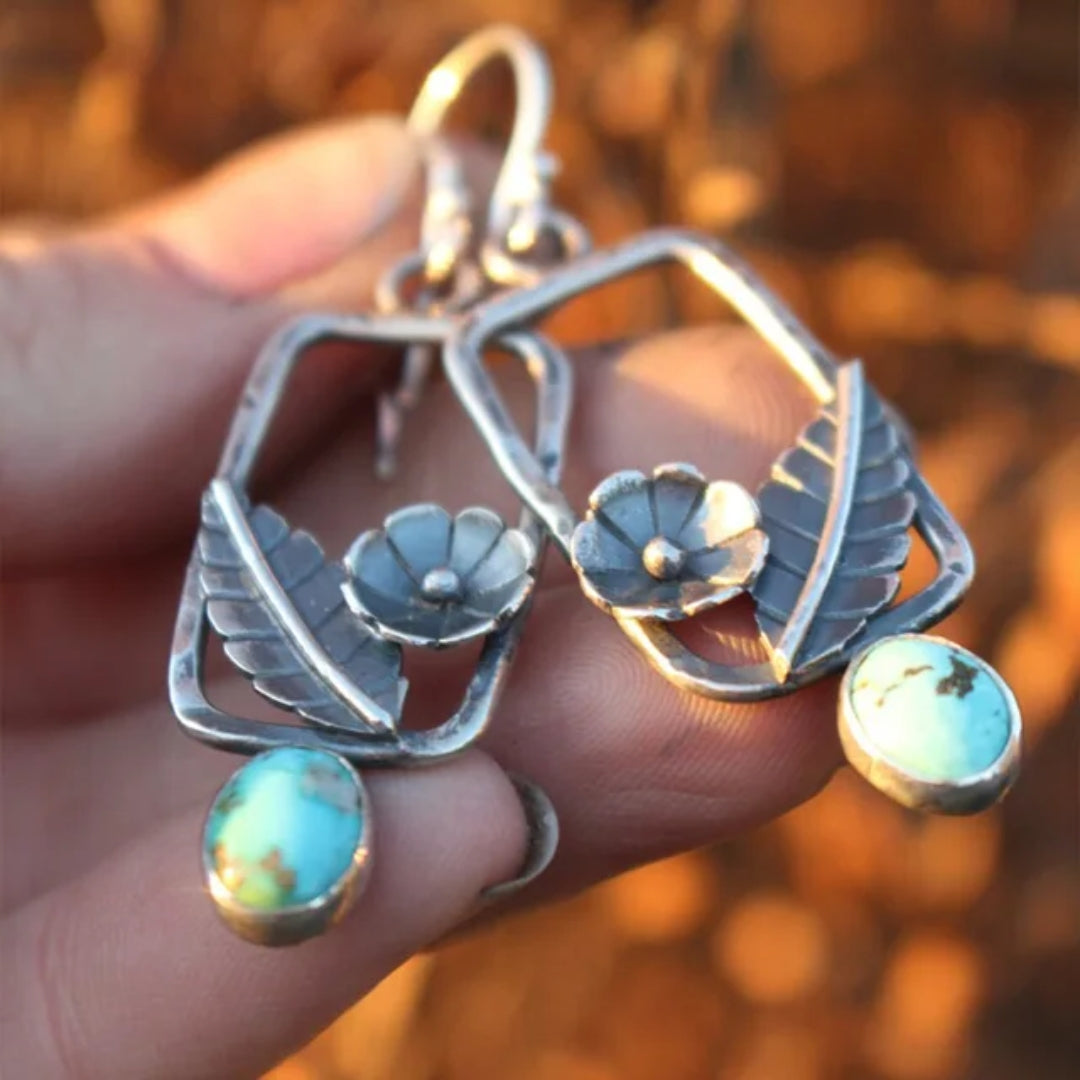 Élégantes boucles d'oreilles vintage en bleu naturel