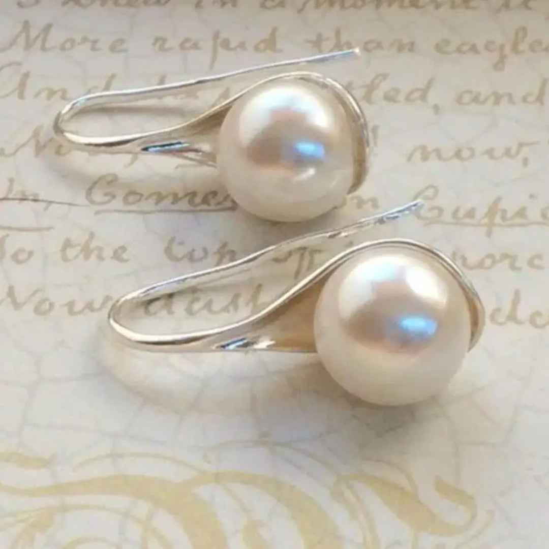 Élégantes boucles d'oreilles avec perles raffinées