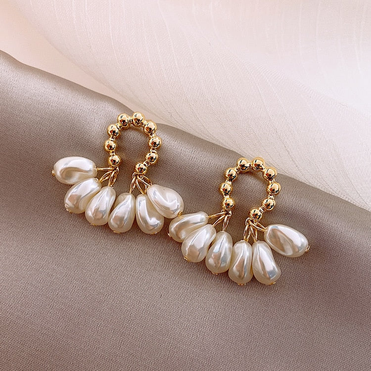 Éblouissantes boucles d'oreilles en perles baroques élégantes