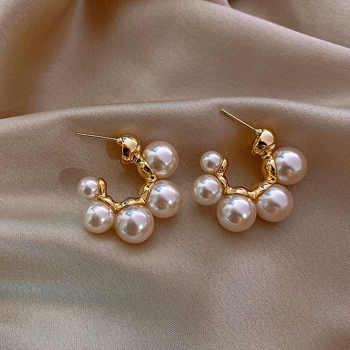 Élégantes boucles d'oreilles en perles raffinées