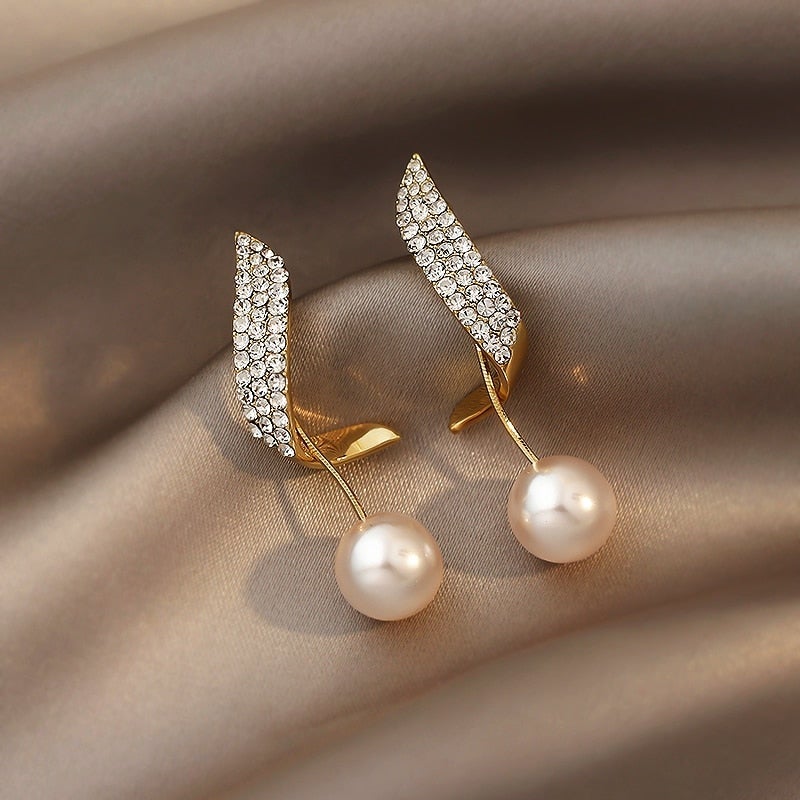 Éblouissantes Boucles d'Oreilles en Perles Dorées