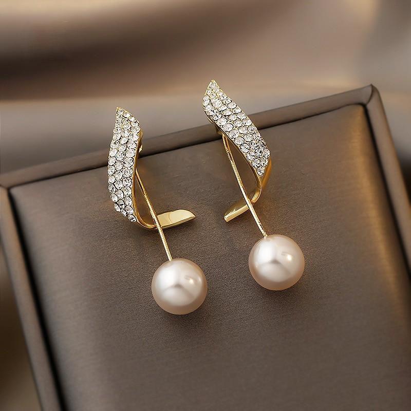 Éblouissantes Boucles d'Oreilles en Perles Dorées