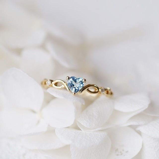 Élégante Bague en Argent et Or avec Cœur Incrusté