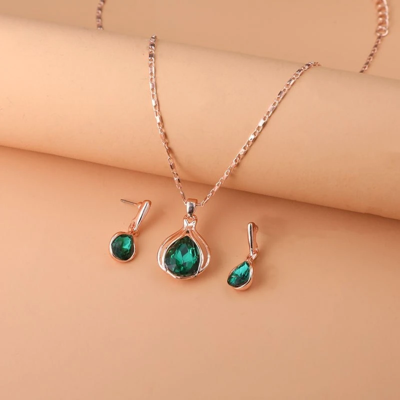 Éblouissant Ensemble Collier et Boucles d'Oreilles en Cristal Vert Doré