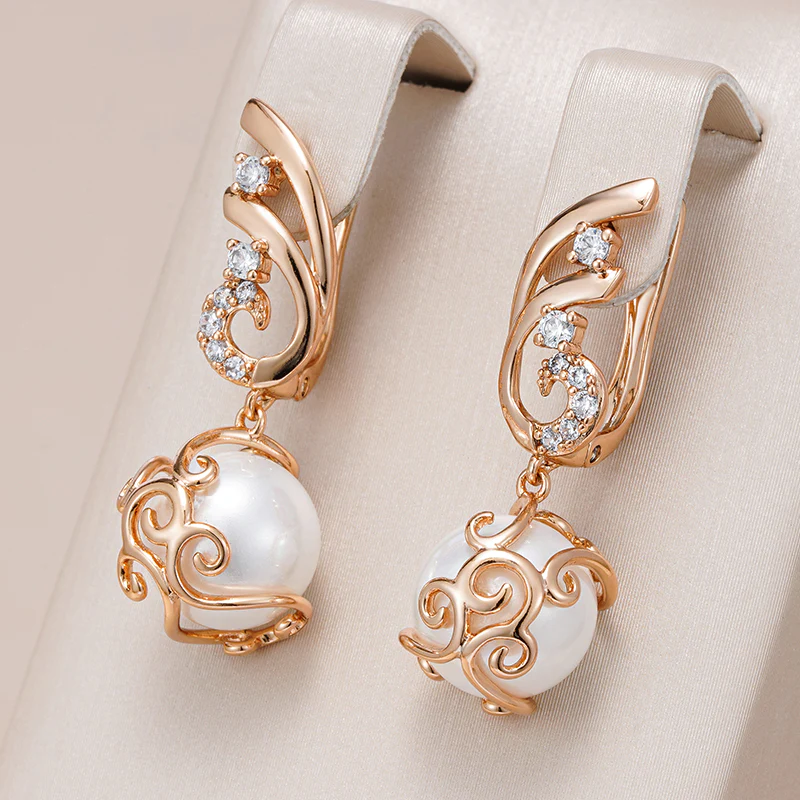 Élégantes boucles d'oreilles en perles dorées