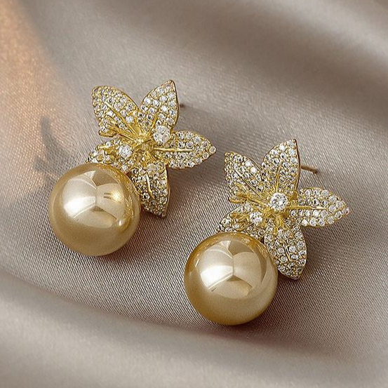 Boucles d'oreilles chic en perles de marguerite scintillantes