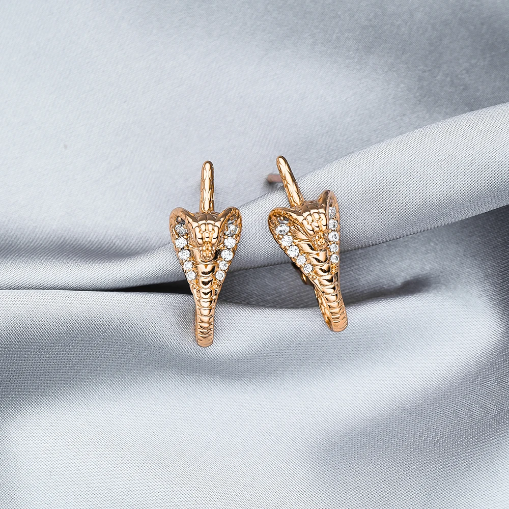 Boucles d'oreilles en or Cobra : un éclat élégant à votre style