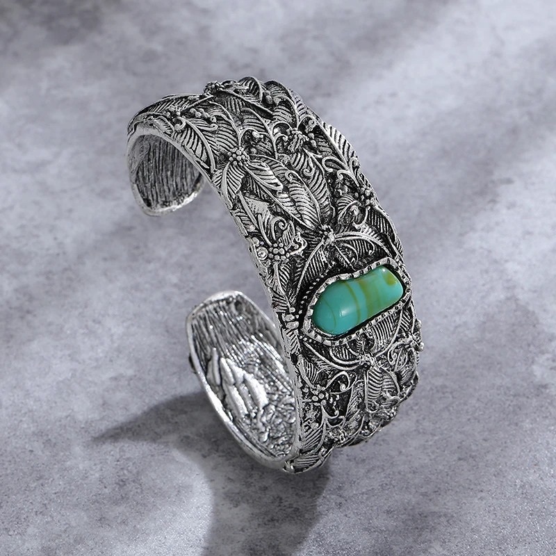 Superbe bracelet vintage en argent orné de turquoise