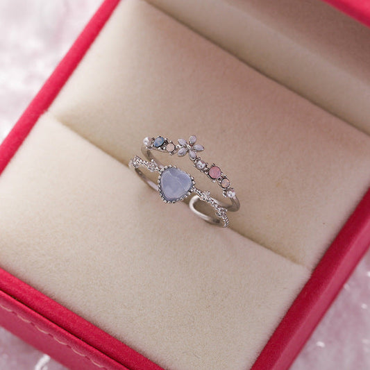 Élégante Bague Ajustable en Argent ornée d'une Pierre Bleue et de Zirconiums Étincelants