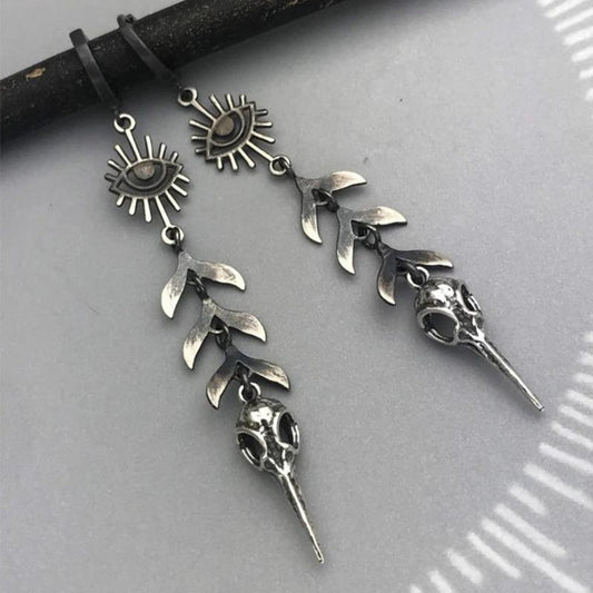 Éblouissantes boucles d'oreilles pendantes en argent au design bohème inspiré de masques