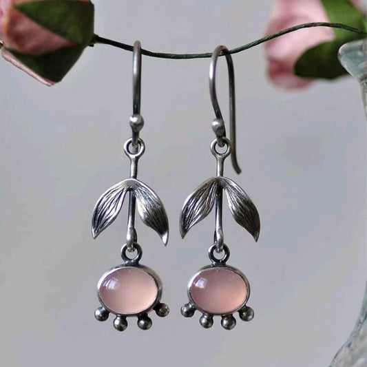 Éblouissantes boucles d'oreilles pendantes en quartz bohème, serties d'argent scintillant