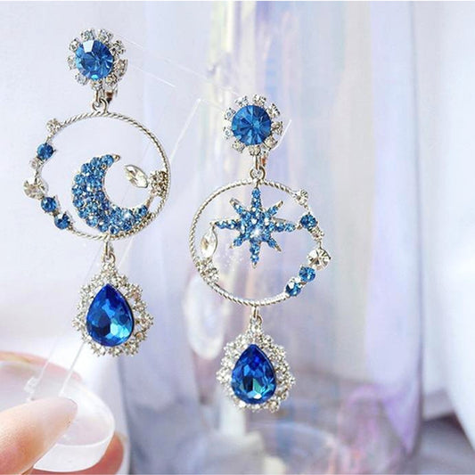 Boucles d'oreilles Élégantes Lune et Étoile en Argent avec Éblouissants Zircons Bleus