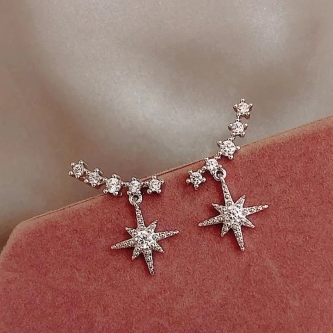 Boucles d'oreilles Étoiles en Or sublimées par des Zirconia étincelants