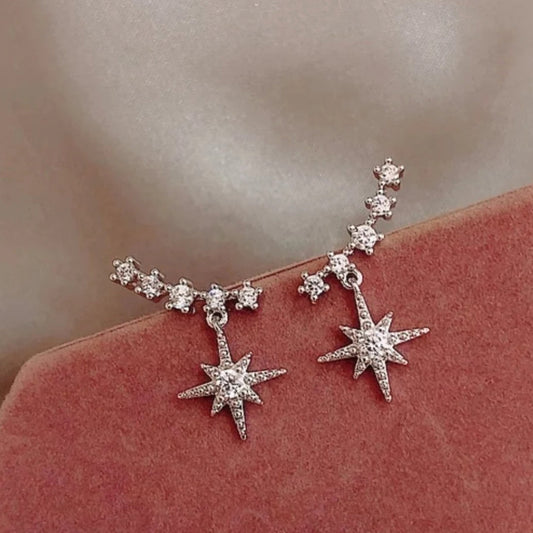 Boucles d'oreilles Étoiles en Or sublimées par des Zirconia étincelants