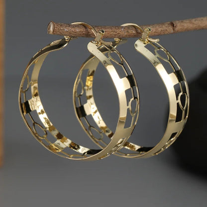 Boucles d'oreilles vintage ajourées en or et argent délicat