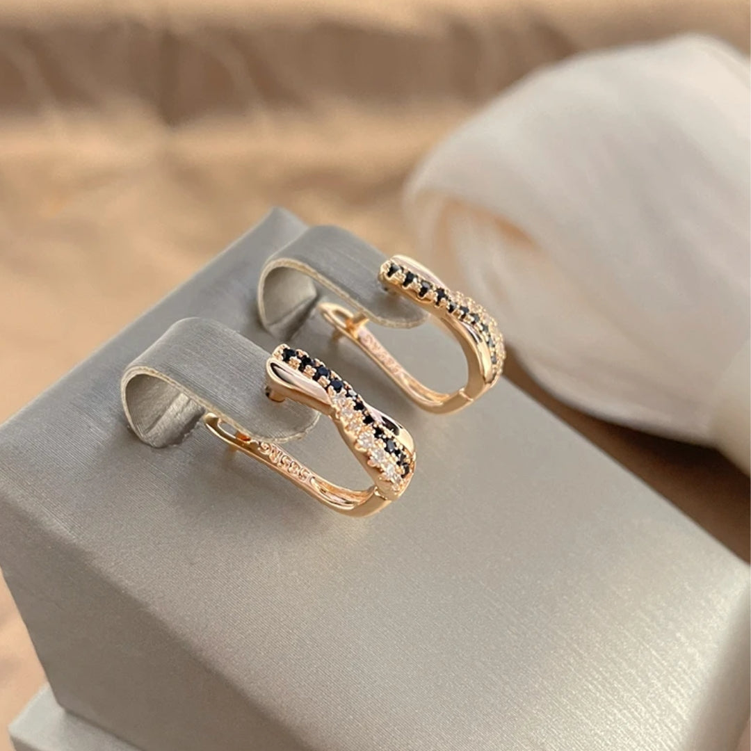 Éblouissantes boucles d'oreilles en cristal noir pour une touche de sophistication