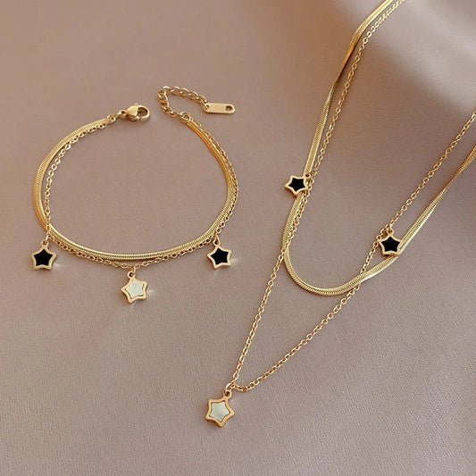 Éblouissants Bijoux Étoilés en Élégant Noir et Blanc