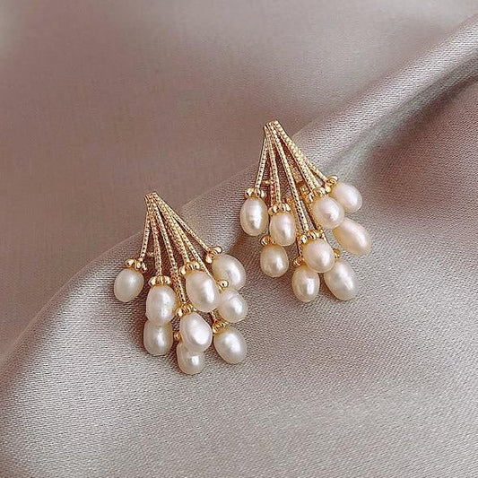 Éclatantes boucles d'oreilles en cascade de perles