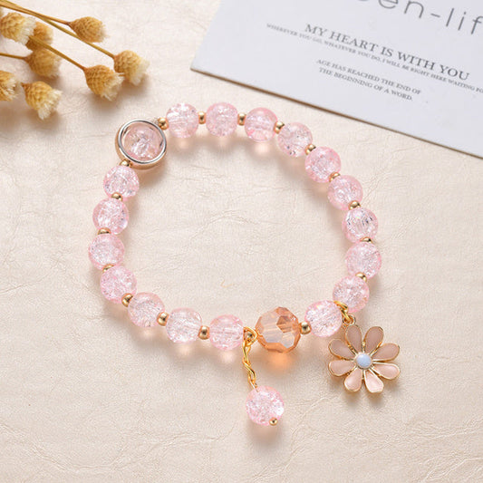Élégant Bracelet en Pierre Rose Orné de Fleurs de Marguerites en Or