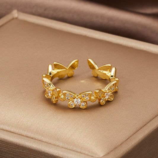 Bague en or ajustable avec élégants papillons