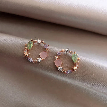 Éblouissantes Boucles d'Oreilles Fleurs en Or Serties de Zirconia