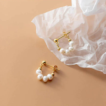 Éblouissantes Boucles d'Oreilles en Perles Dorées