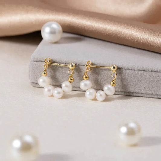 Éblouissantes Boucles d'Oreilles en Perles Dorées