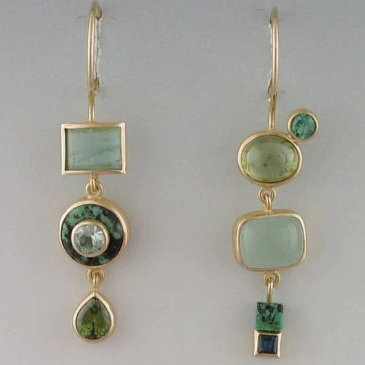 Éblouissantes boucles d'oreilles pendantes en vert éclatant