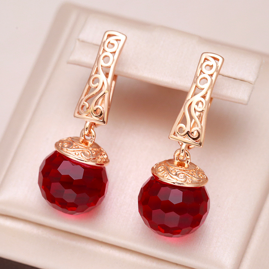 Boucles d'oreilles en Or avec Éblouissantes Boules de Cristal Rouge