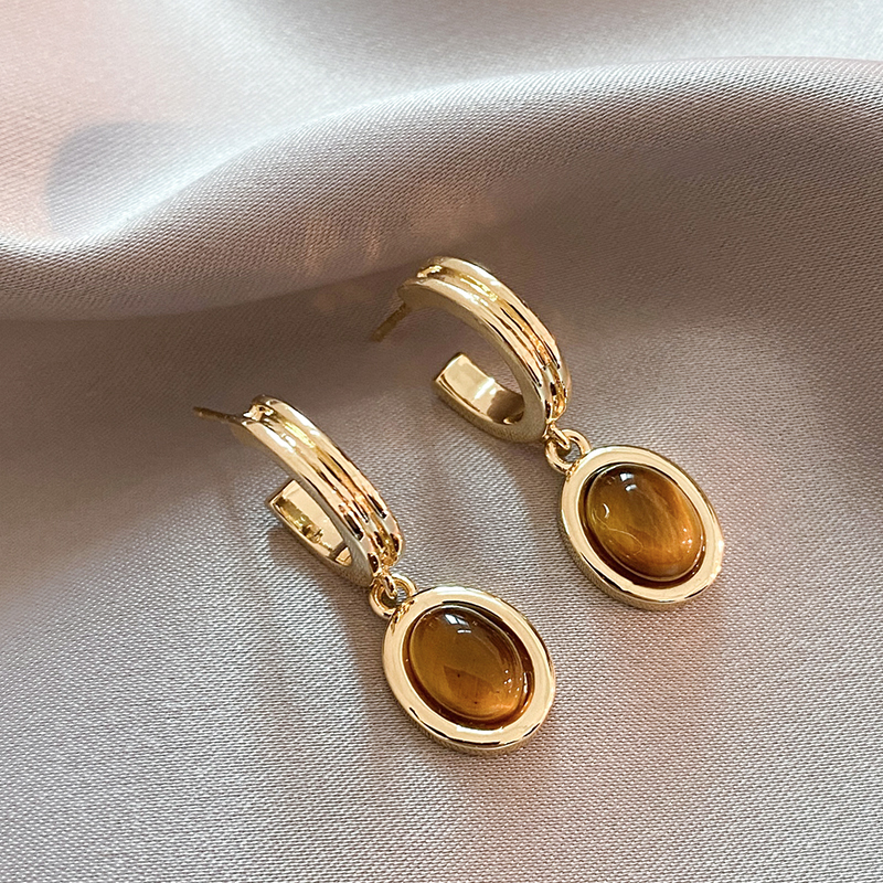 Éblouissantes boucles d'oreilles en cristal orange et doré pour un look chic et raffiné