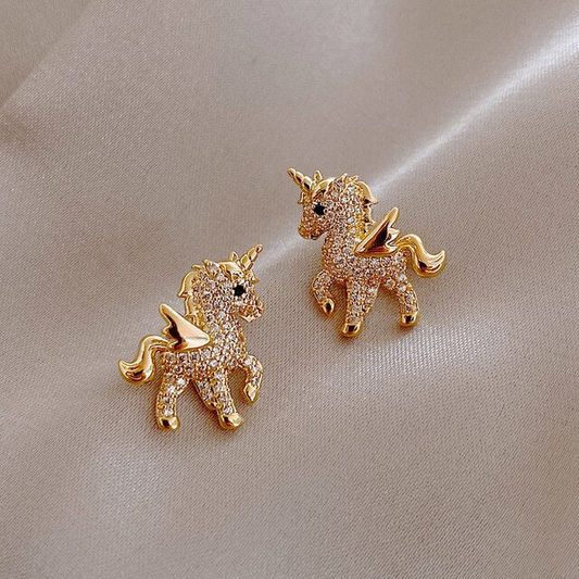 Éblouissantes boucles d'oreilles licorne en or scintillant