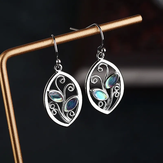 Éblouissantes boucles d'oreilles vintage en cristal argenté