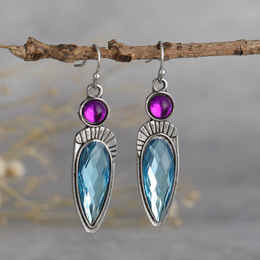 Éblouissantes boucles d'oreilles vintage en cristaux bleu et violet