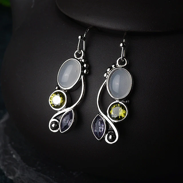 Boucles d'oreilles élégantes en zircon jaune avec éclat de pierre de lune