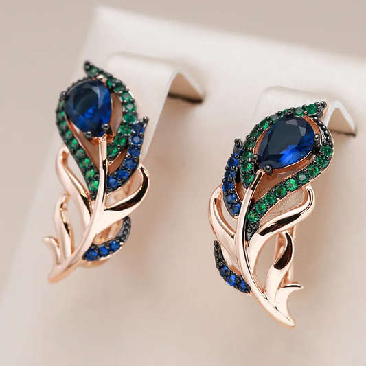 Éblouissantes boucles d'oreilles ornées de magnifiques cristaux verts et bleus