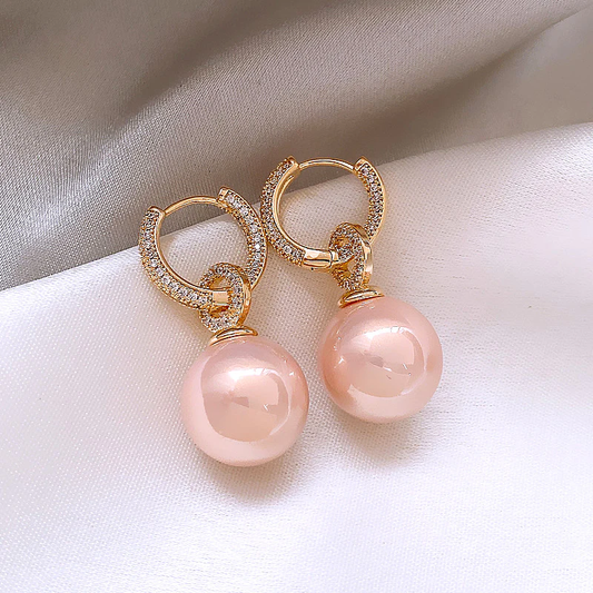 Chic Boucles d'Oreilles en Perles Roses Élégantes