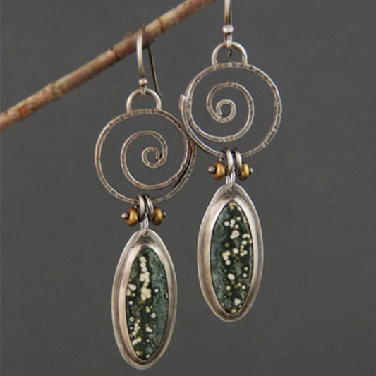 Éblouissantes boucles d'oreilles pendantes vert émeraude