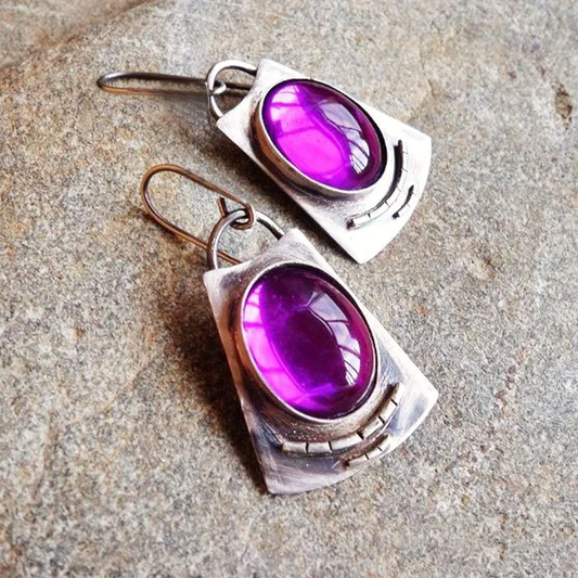 Boucles d'oreilles vintage envoûtantes de couleur mauve