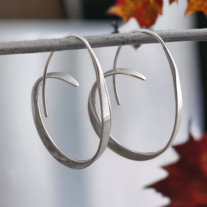 Spirales Élégantes : Boucles d'Oreilles Uniques