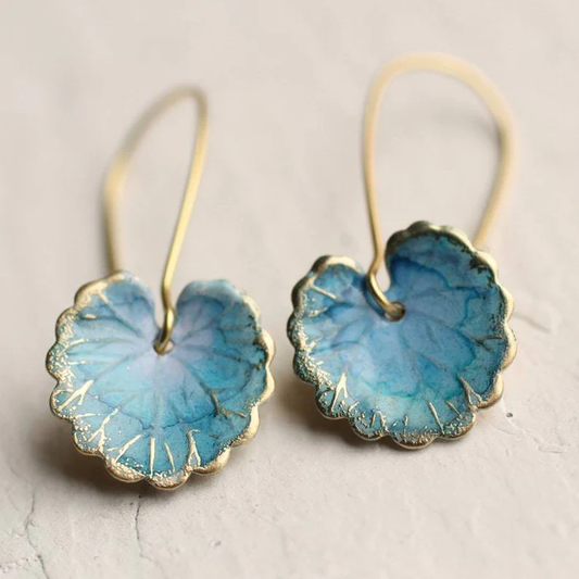 Éblouissantes boucles d'oreilles vintage avec délicates feuilles bleues