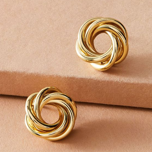 Éblouissantes boucles d'oreilles vintage en spirale dorée