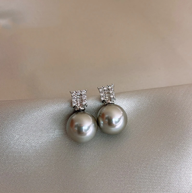 Boucles d'oreilles raffinées en perles de zirconium scintillantes