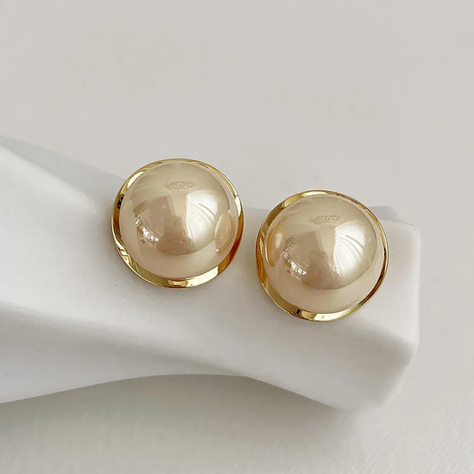 Boucles d'oreilles chic avec de somptueuses perles épaisses