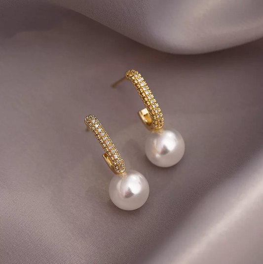 Boucles d'oreilles raffinées en perles dorées scintillantes