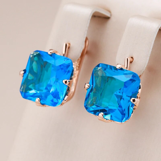 Éblouissantes boucles d'oreilles en cristal cubique bleu pour un look raffiné
