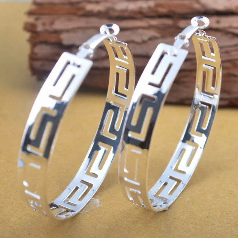 Boucles d'oreilles vintage ajourées en or et argent délicat