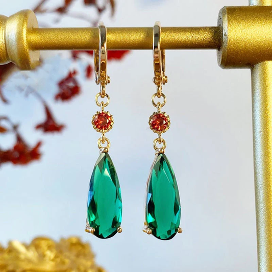 Élégantes boucles d'oreilles pendantes en cristal turquoise scintillant