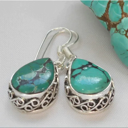 Élégantes boucles d'oreilles vintage en turquoise naturelle